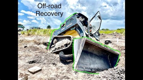 how to get a skid steer out of mud|skid steer stuck in dirt.